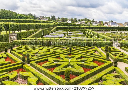 VILLANDRY, FRANCE - JULY 20, 2012: Traditional French garden. Ornamental Garden in Chateau de Villandry. Chateau de Villandry (castle-palace) - world known for its amazing gardens.