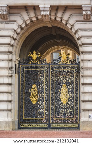 LONDON, UK - MAY 30, 2013: Buckingham Palace in London, England. Built in 1705, the Palace is the official London residence and principal workplace of the British monarch. Door.