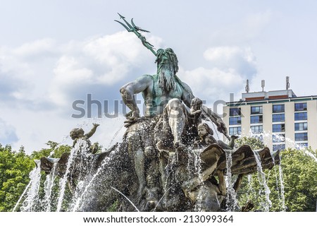 Neptune fountain (Neptunbrunnen, design Reinhold Begas, 1891). Roman god Neptune in center. Four women around him represent the four main rivers of Prussia: Elbe, Rhine, Vistula and Oder.