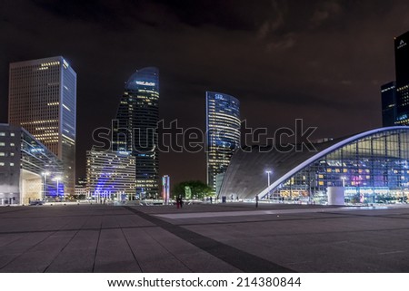 PARIS, FRANCE - MAY 9, 2014: Business district of Defense to the west of Paris at night. Defense is biggest business district in France and most of large companies have offices here.