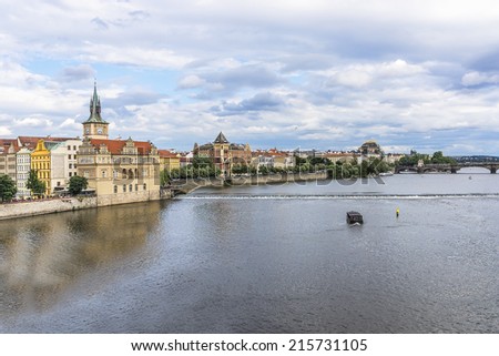 Picturesque views of the Old Town with its ancient architecture and banks of Vltava River at sunset, Prague, Czech Republic.