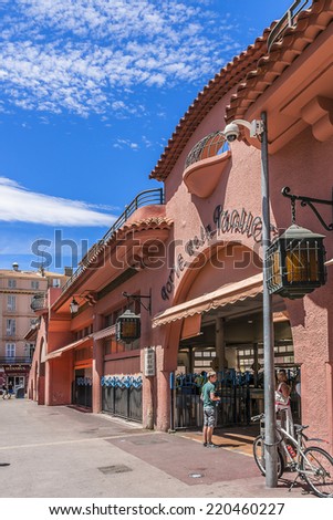 CANNES, FRANCE - JULY 10, 2014: View of market Forville - seasonal produce, local fish and flowers, this large covered market in the heart of the city.