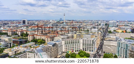 BERLIN, GERMANY - JUNE 16, 2014: Berlin Skyline City Panorama with blue sky. Iconic television tower (Fernsehturm) overlooking Berlin.