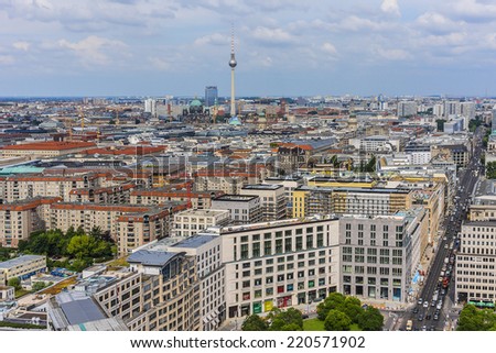 BERLIN, GERMANY - JUNE 16, 2014: Berlin Skyline City Panorama with blue sky. Iconic television tower (Fernsehturm) overlooking Berlin.