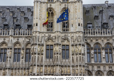 Architectural fragment of Town Hall (Hotel de Ville) on Grand Place (Grote Markt) - central square of Brussels - most important tourist destination and most memorable landmark in Brussels, Belgium.