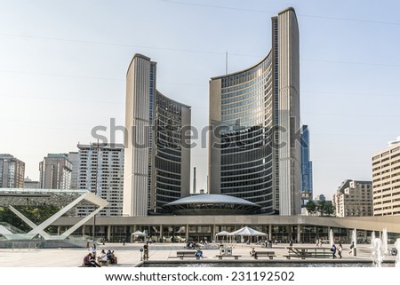 TORONTO, CANADA - JULY 23, 2014: City Hall (or New City Hall, by Finnish architect Viljo Revell, 1965) is one of Toronto's best known landmarks. City Hall is home of municipal government of Toronto.