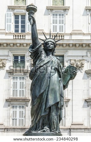 NICE, FRANCE - JULY 11, 2014: View Statue of Liberty. A replica of America's most famous monument, Statue of Liberty, is to be installed February 1, 2014 in Nice by Mayor of Nice Christian Estrosi.