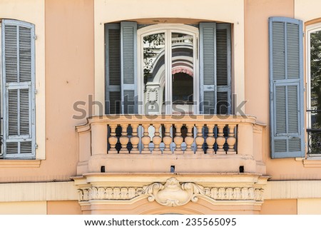 French house with traditional balconies and windows. Nice, France.