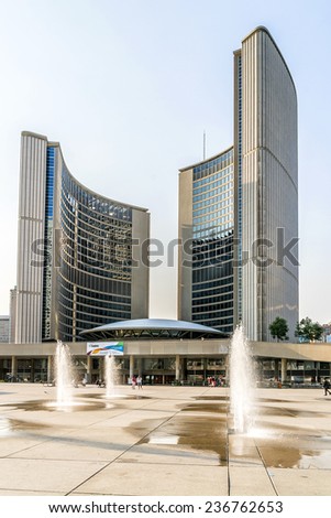 TORONTO, CANADA - JULY 23, 2014: City Hall (or New City Hall, by Finnish architect Viljo Revell, 1965) is one of Toronto's best known landmarks. City Hall is home of municipal government of Toronto.
