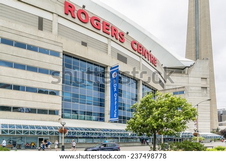 TORONTO, CANADA - JULY 23, 2014: View of Rogers Centre (or SkyDome, opened in 1989). Rogers Centre is a multi-purpose stadium situated next to CN Tower in downtown Toronto, Ontario