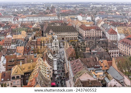 Aerial view of Strasbourg to the old city with red roof tiles. France. Strasbourg is the capital and principal city of Alsace region in eastern France and is official seat of European Parliament.