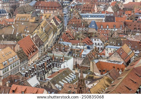 Aerial view of Strasbourg to the old city with red roof tiles. France. Strasbourg is the capital and principal city of Alsace region in eastern France and is official seat of European Parliament.