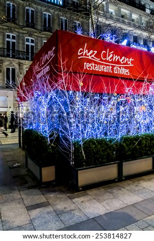 PARIS, FRANCE - 22 DECEMBER, 2014: Christmas illumination at Avenue Champs-Elysees. Champs-Elysees is one of the most famous streets in the world.