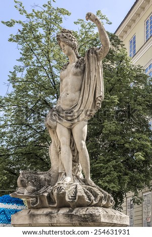 An ancient statue on the central square of Lviv - Market (Rynok) Square near City Hall. Lviv - city in western Ukraine, capital of historical region Galicia