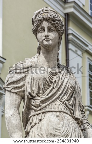 An ancient statue on the central square of Lviv - Market (Rynok) Square near City Hall. Lviv - city in western Ukraine, capital of historical region Galicia