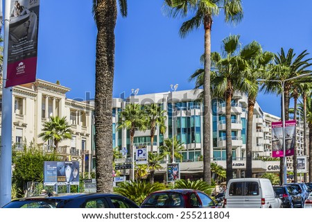 CANNES, FRANCE - AUGUST 30, 2011: Cityscapes Cannes. Cannes - a resort in southern France: many flowers and palm, luxury boutiques and restaurants, cafes, luxurious hotels - all for leisure travelers.
