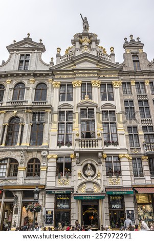 BRUSSELS, BELGIUM - JUNE 19, 2014: Houses of the famous Grand Place (Grote Markt) - the central square of Brussels. Grand Place was named by UNESCO as a World Heritage Site in 1998.