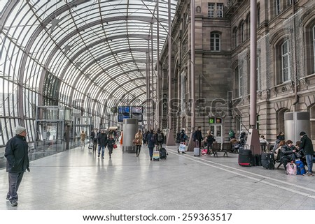STRASBOURG, FRANCE - DECEMBER 21, 2014: Gare de Strasbourg, the main railway station of Strasbourg city, Alsace region, France. View of original building under the modern glass canopy.