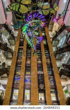 KIEV, UKRAINE - MARCH 28, 2015: Interior of shopping center Gulliver (130 stores, 8-storey atrium). Similar decisions were taken from most advanced projects implemented in Dubai, Hong Kong and London.