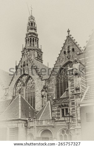 Old Church (Oude Kerk) - the oldest building and oldest parish church, founded in 1213, Amsterdam, Netherlands. It stands in De Wallen, now Amsterdam\'s main red-light district. Antique vintage.