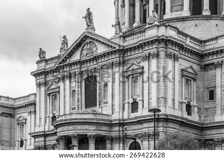 Close up of Magnificent St. Paul Cathedral in London. It sits at top of Ludgate Hill - highest point in City of London. Cathedral was built by Christopher Wren between 1675 and 1711. Black and white.