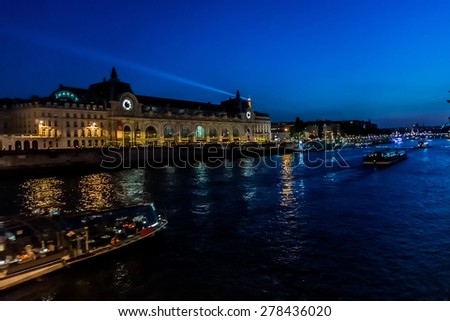 D\'Orsay Museum on left bank of Seine at night. Museum is housed in former Gare d\'Orsay. Orsay holds mainly French art dating from 1848 to 1915. Paris, France.