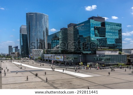 PARIS, FRANCE - JUNE 3, 2015: Skyscrapers in business district of Defense to the west of Paris. Defense is biggest business district in France and most of large companies have offices here.
