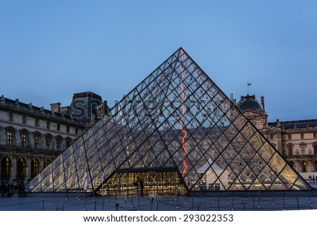 PARIS, FRANCE - JUNE 10, 2015: View of famous Louvre Museum late evening. Louvre Museum is one of the largest and most visited museums worldwide.