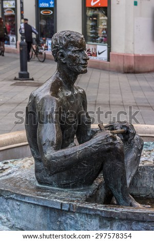 GYOR, HUNGARY - APRYL 21, 2014: Boatman sculpture on pedestrian zone of Gyor (or Raab) - capital of Gyor-Moson-Sopron county and Western Transdanubia region.
