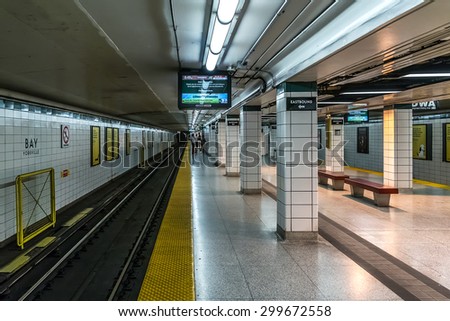 TORONTO, CANADA, ON - 24 JULY, 2014: Subway station platform in Toronto. Toronto subway and RT encompass four lines and 69 stations.