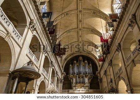 PARIS, FRANCE - JUNE 11, 2015: Interiors of Chapel of Saint Louis des Invalides in Paris. Chapel built in 1679 is the burial site for some of France\'s war heroes, notably Napoleon Bonapart.