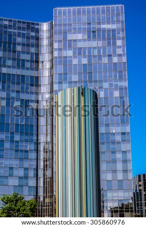 PARIS, FRANCE - JUNE 8, 2015: Skyscrapers in business district of Defense to the west of Paris. Defense is biggest business district in France and most of large companies have offices here.