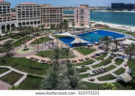 ABU DHABI, UNITED ARAB EMIRATES - SEPTEMBER 5, 2015: Beautiful area 5 stars Hotel Ritz-Carlton Abu Dhabi, Grand Canal (532 rooms, gardens with private beach, pool, gym and 10 restaurants).
