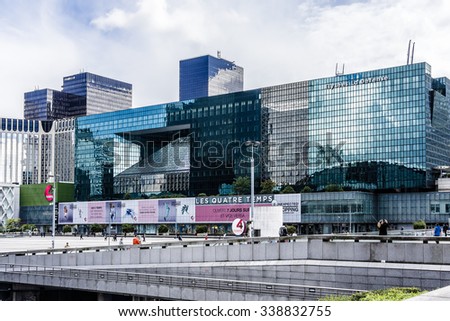 PARIS, FRANCE - MAY 13, 2014: View of business district of Defense to the west of Paris. Defense is biggest business district in France and most of large companies have offices here.