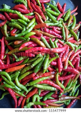 The fruit of the bird\'s eye chili is popularly used as a spice in South-east Asian cuisine.