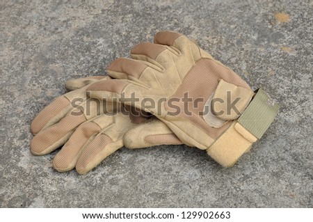 Leather gloves for riding motorcycles and shooting guns.