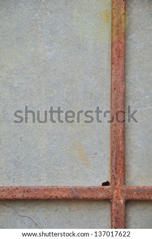 The rusty iron rods with gypsum board.