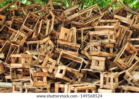 A crate is a large shipping container, often made of wood, typically used to transport large, heavy items.