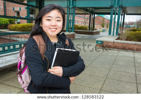 Female student on campus backpack