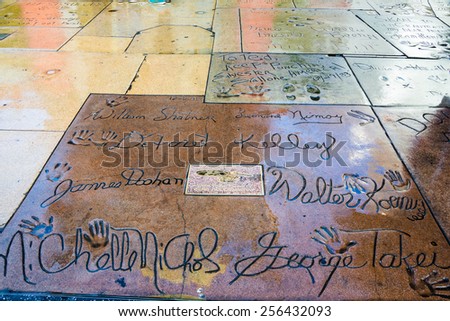HOLLYWOOD, CA - Dec 12, 2014: Hand Prints and signatures of the Cast of Star Trek on 25th Anniversary Plaque in front of Mann TCL Chinese Theater Hollywood. William Shatner, Leonard Nimoy, and others.