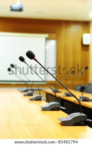 Microphone standing on a meeting room table