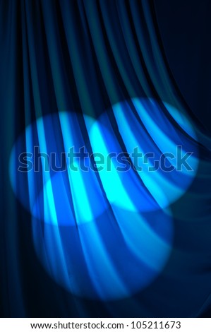 Brightly lit curtains in theater concept