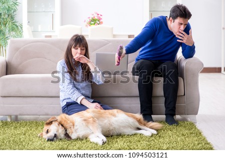 Man having allergy from dog fur