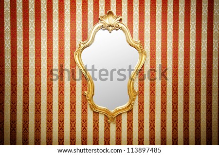 Ornate mirror on the wall Ornate mirror on the wall
