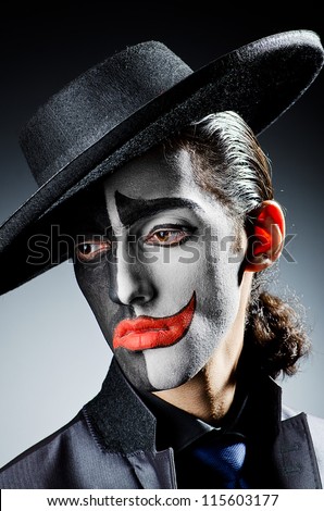 Businessman with clown face paint Businessman with clown face paint
