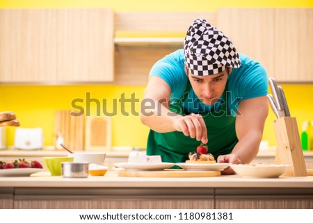 Man cook preparing cake in kitchen at home