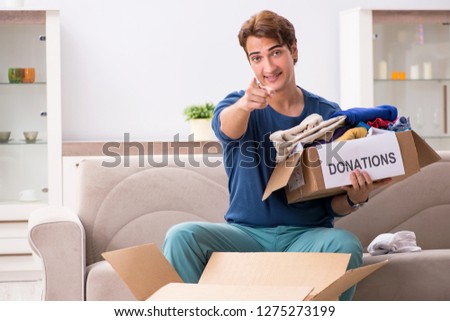 Concept of charity with donated clothing