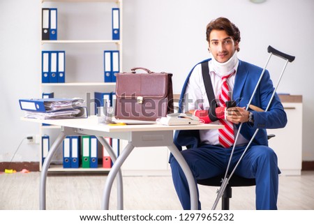 Injured employee working in the office
