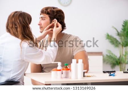 Patient with hearing problem visiting doctor otorhinolaryngologi