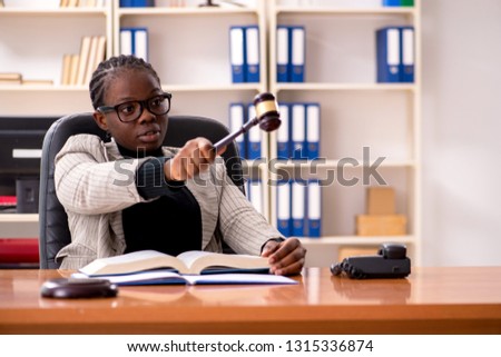 Black female lawyer in courthouse